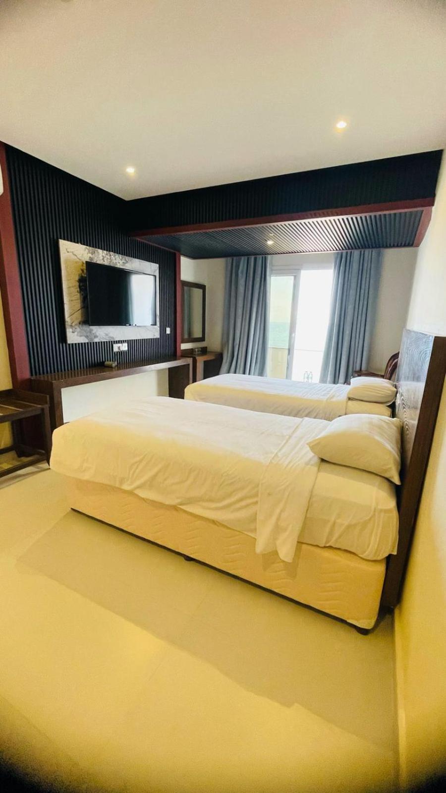 Resort Sur Beach Holiday Extérieur photo